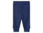 Pantalon côtelé pour bébé de couleur bleu marine.