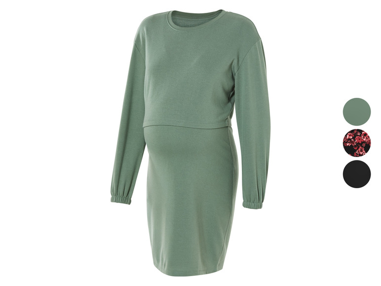 Une robe de grossesse verte à manches longues