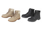 Beige en zwarte leren laarzen met veters.