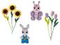 Tournesols, papillon, tulipes et lapin en salopette au crochet