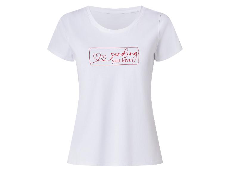 T-shirt blanc à manches courtes avec le texte 'sending you love' et un motif de cœur