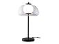 Lampe de table moderne avec abat-jour en verre transparent et base noire.
