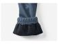 Close-up van een donkerblauwe, fleece gevoerde manchet.