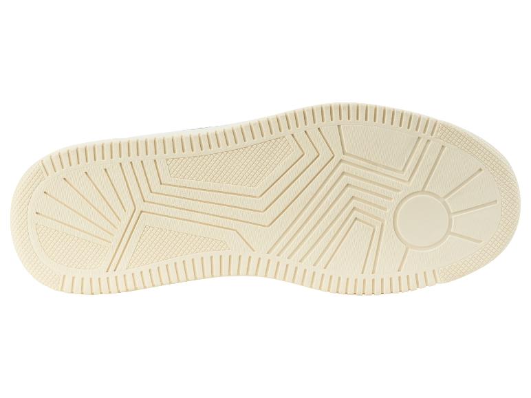 Semelle de baskets crème, design minimaliste.