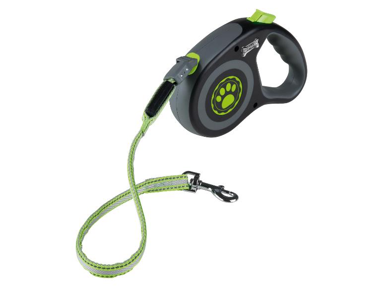 Une laisse rétractable pour chien de la marque Zoo-Fari, noire et verte.
