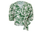 Wit bloesje met groene bladerenprint en strik.