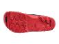 Semelle rouge d'une chaussure Parkside, fabriquée en Italie, avec un motif d'adhérence texturé.