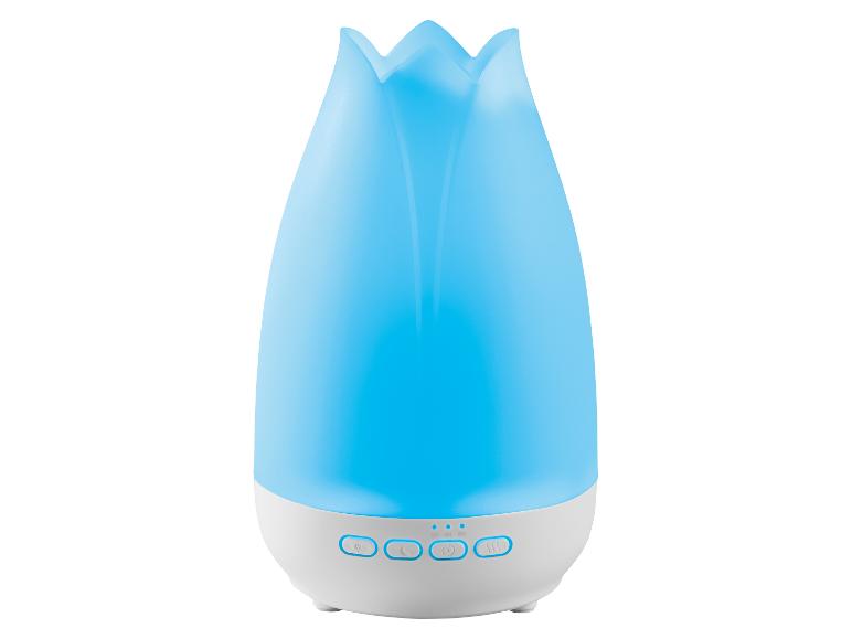 Diffuseur d'huiles essentielles bleu en forme de fleur avec boutons en bas.