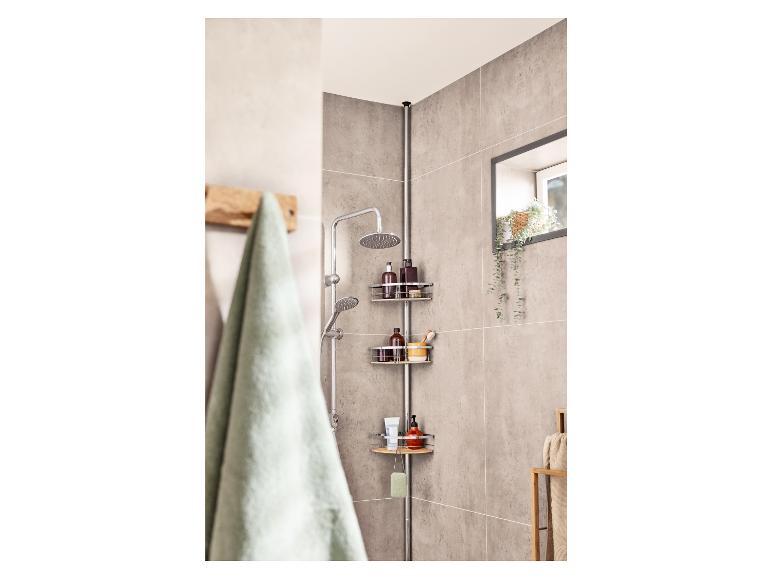 Driehoekige douchemand met shampoo en douchegel in een moderne badkamer.