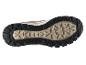 Semelle de chaussure de randonnée noire et beige avec une bande de roulement robuste.
