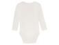 Un body blanc à manches longues pour bébé.
