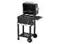 Un barbecue noir Grillmeister avec le couvercle ouvert et une table latérale.