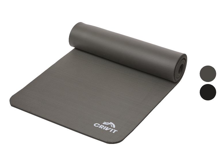 Tapis d'exercice Crivit gris, partiellement roulé, avec un motif rayé et deux options de couleur.