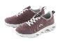 Een paar bruine Crivit sneakers met een witte zool en witte veters.