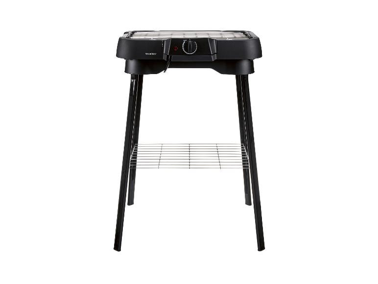 Barbecue électrique SilverCrest avec grille et support.