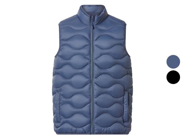 Blauw gewatteerd vest met golvende stiksels en ritssluiting