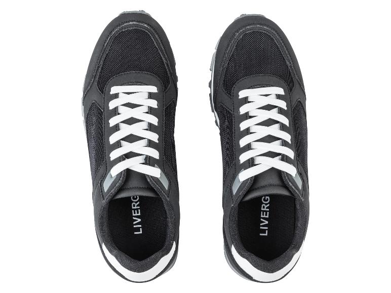 Zwarte sneakers met witte veters van het merk Liverg.
