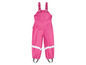 Salopette imperméable rose pour enfants avec des détails réfléchissants.