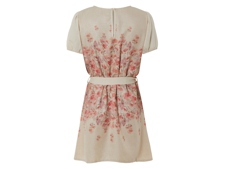 Beige jurk met korte mouwen en bloemenprint.