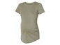 Een lichtgroen T-shirt voor zwangere vrouwen