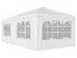 Witte partytent met boogvensters, ideaal voor buitenevenementen.