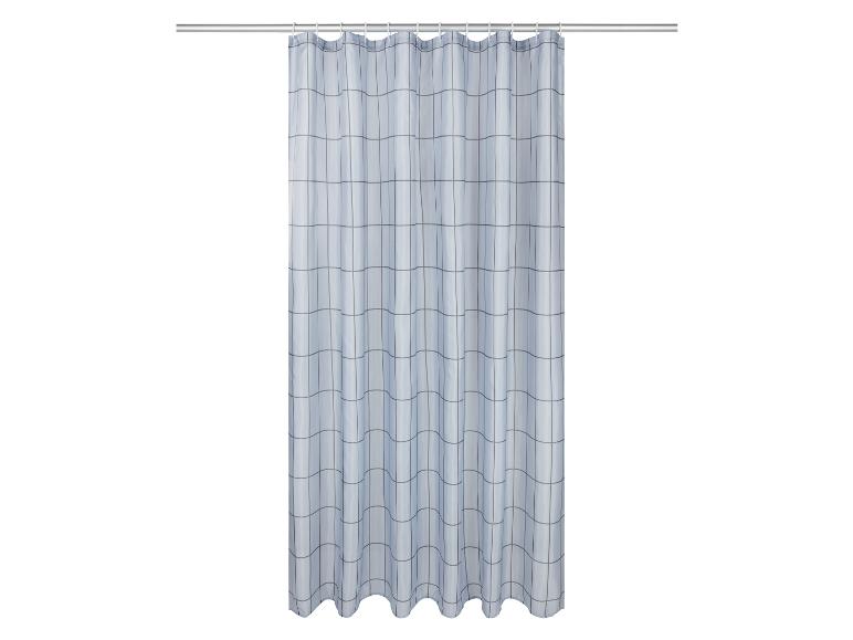 Rideau de douche à carreaux bleus.