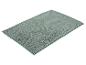 Tapis de bain vert menthe à texture bouclée, sur fond blanc