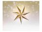 Étoile décorative dorée et blanche avec lumières sur fond bokeh doré.