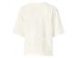 T-shirt blanc ample à manches courtes en tissu texturé, vue de dos.
