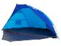 Blauwe en zwarte tent voor kamperen of strand.