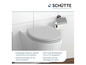 Een witte toiletbril en toiletpapierhouder van Schütte.