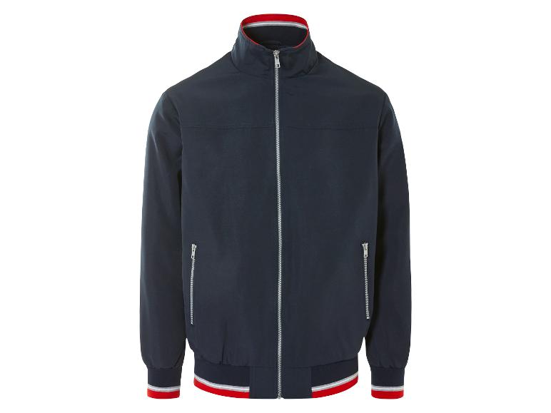 Une veste bomber bleu marine avec des détails rouges et gris.