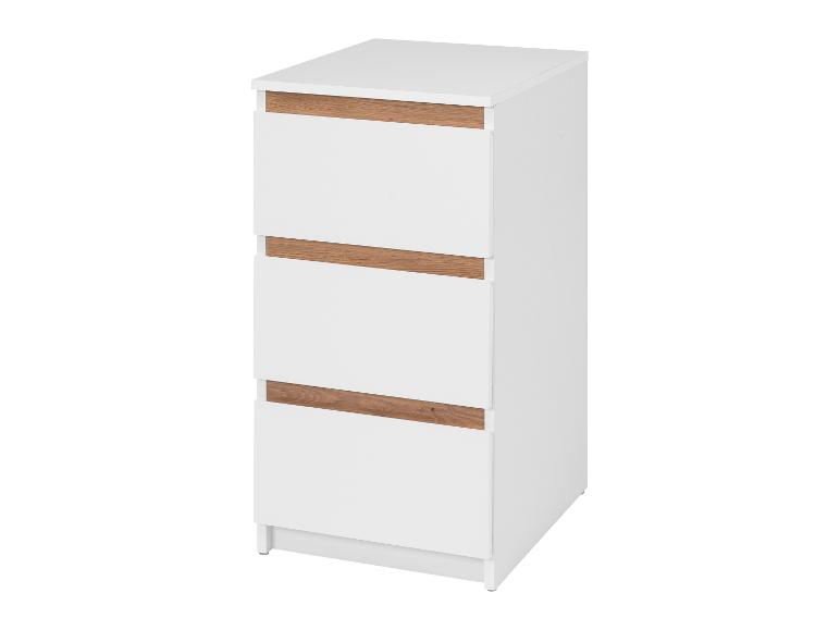 Commode blanche avec trois tiroirs et accents en bois.