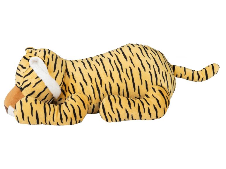 Gele tijger knuffel met zwarte strepen, liggend op een wit oppervlak.