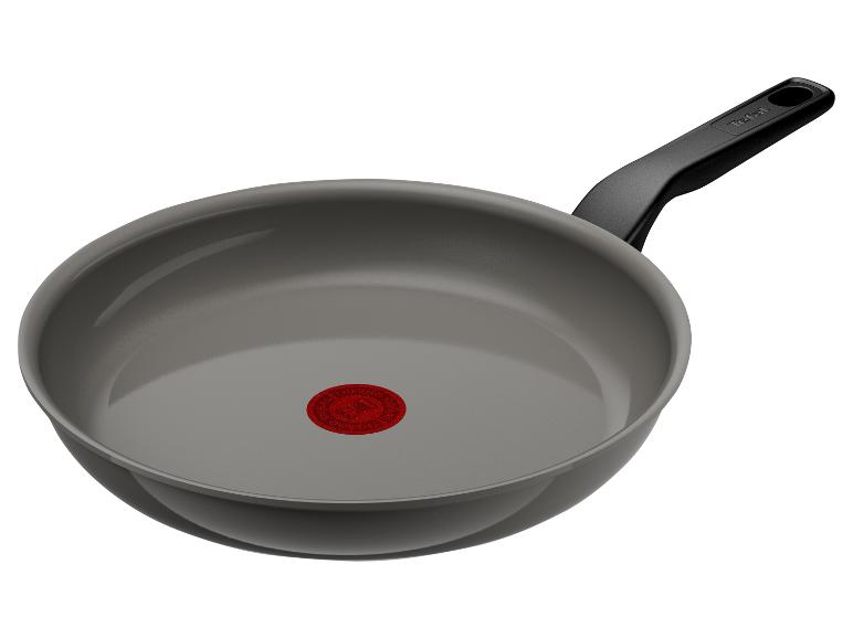 Grijze Tefal koekenpan met zwart handvat en rode warmte-indicator
