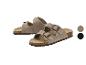 Sandales en daim avec boucles ajustables et semelle en liège, disponibles en beige et noir.