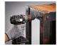 Perceuse-visseuse sans fil Parkside utilisée pour assembler une table en bois et métal.