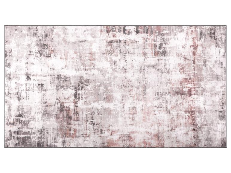 Tapijt in grijze en roze tinten met een abstract patroon.