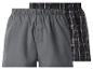 Deux boxers, un gris et un à carreaux noirs.