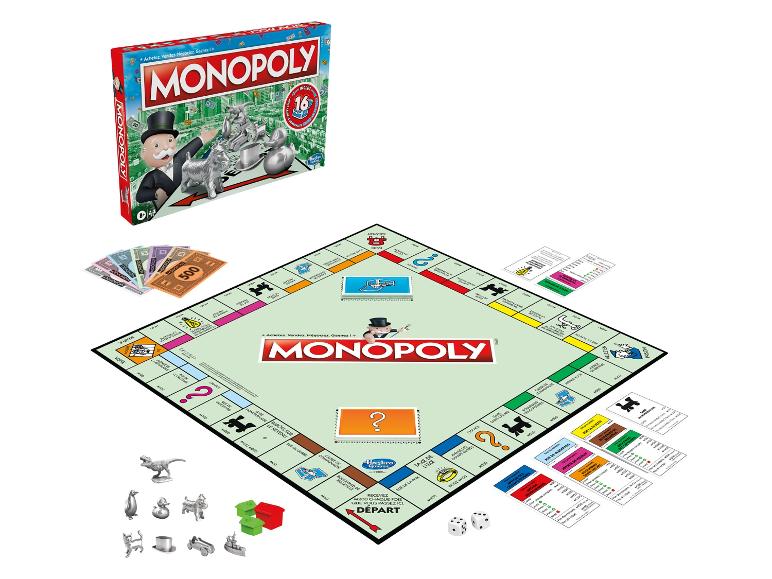 Le jeu de société Monopoly avec son plateau, de l'argent, des pions et des cartes.
