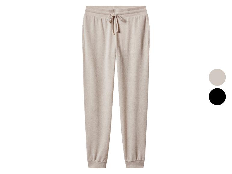 Beige damesjoggingbroek met trekkoord in de taille, ook verkrijgbaar in zwart.