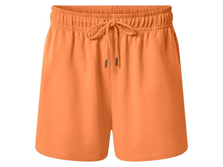 Oranje sweatshorts met elastische tailleband en trekkoord.