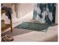 Rideau de douche LIVARNO dans une salle de bain avec tapis et étagère.