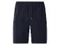 Short texturé bleu foncé pour homme avec taille élastique et cordon de serrage.