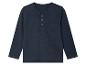 Donkerblauw longsleeve shirt met drie knopen en zak.