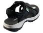 Sandales de sport noires avec brides réglables et accents vert menthe.