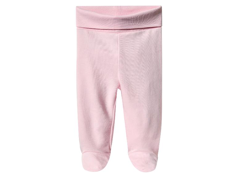 Roze baby leggings met omslagen aan de enkels.