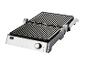 Elektrische grill met geribbelde platen: perfect voor het grillen van vlees en groenten.