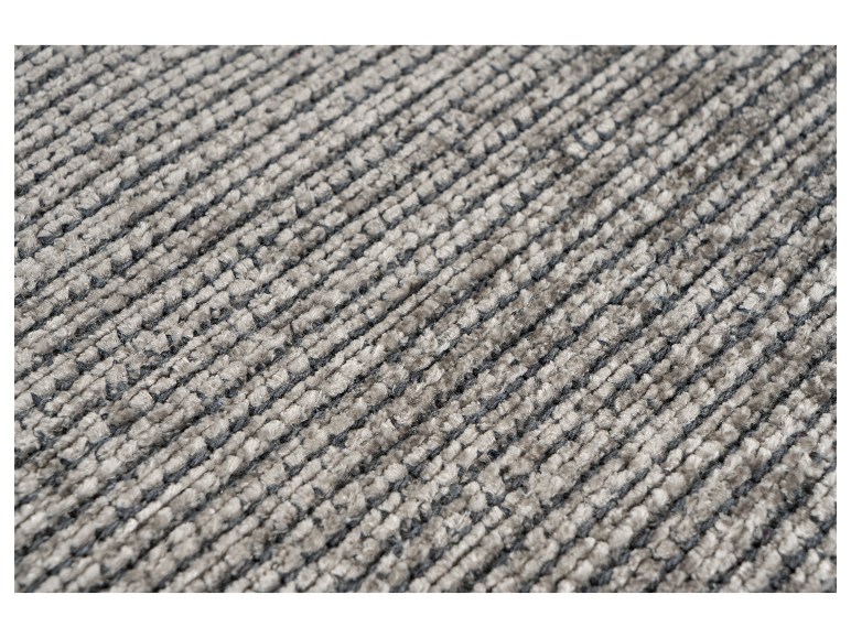 Tapis texturé gris et beige.