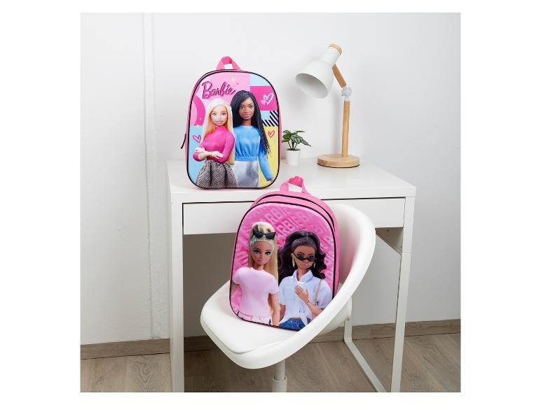 Deux sacs à dos roses avec un motif Barbie.